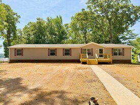 203 Lost Forest Rd in Bracey, VA - Building Photo