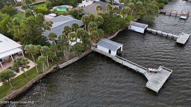 10620 S Tropical Trail in Merritt Island, FL - Foto de edificio - Building Photo