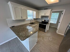1400 Cypress Dr in Greenwood, MO - Building Photo - Building Photo