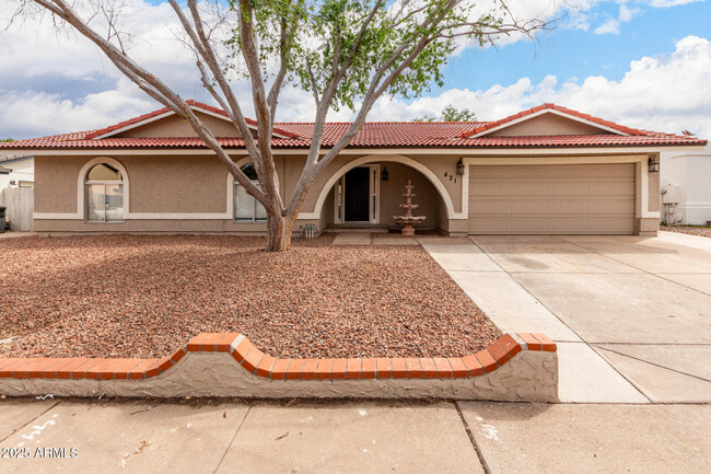 property at 421 E San Angelo Ave