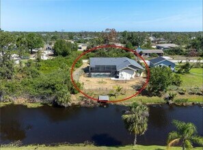 11195 Seabreeze Ave in Port Charlotte, FL - Building Photo - Building Photo