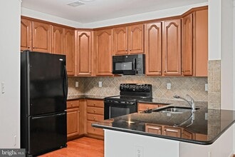 24701 Byrne Meadow Square, Unit 202 in Aldie, VA - Building Photo - Building Photo