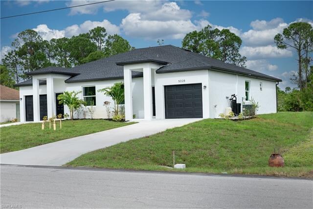 1141 Gilbert Ave S in Lehigh Acres, FL - Building Photo