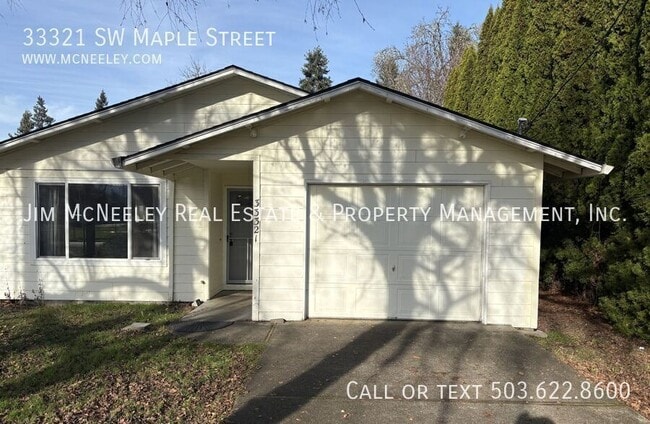 property at 33321 SW Maple St
