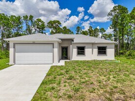 1051 Milwaukee Blvd in Lehigh Acres, FL - Building Photo