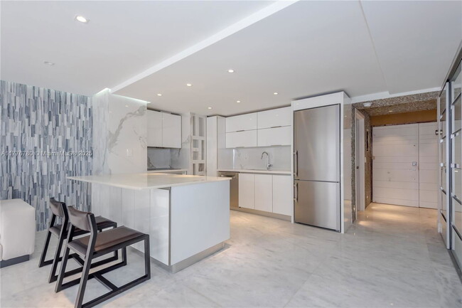 property at 6423 Collins Ave