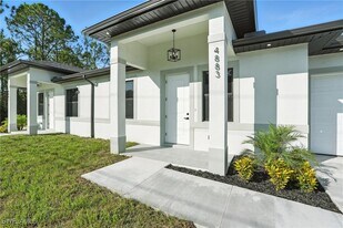 4881-4883 Leonard Blvd S in Lehigh Acres, FL - Building Photo