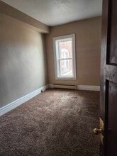 129 N Jefferson St in Mount Pleasant, IA - Foto de edificio - Building Photo