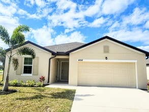 4656 SW Lassiter Ter, Unit 1 in Port St. Lucie, FL - Building Photo - Building Photo