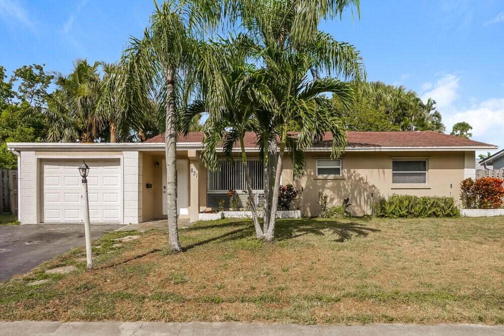 831 NW 43rd Ave in Coconut Creek, FL - Building Photo