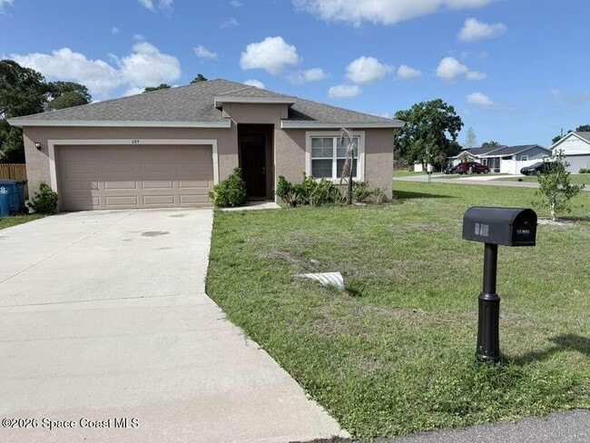 609 Concha St NW in Palm Bay, FL - Building Photo - Building Photo