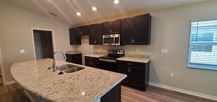 875 Orleans Dr in Eagle Lake, FL - Building Photo - Building Photo