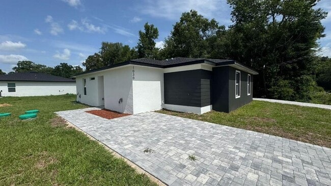 1030 NW 57th Ct in Ocala, FL - Foto de edificio - Building Photo