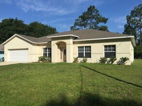 55 Pebble Beach Dr in Palm Coast, FL - Building Photo - Building Photo