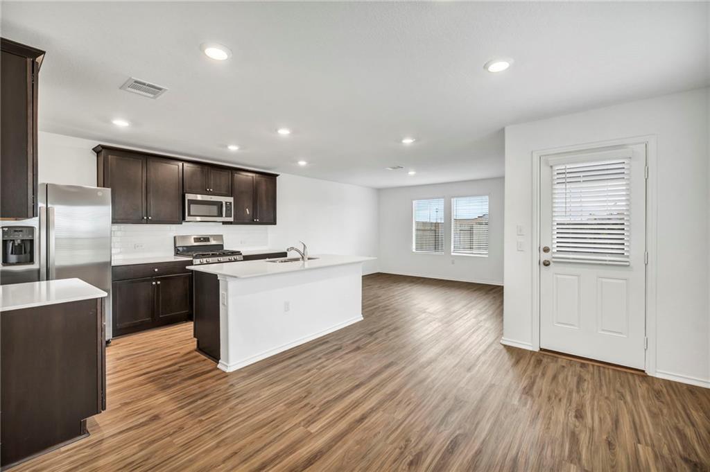 7240 Dancing Wind Ln, Unit 1 in Del Valle, TX - Building Photo