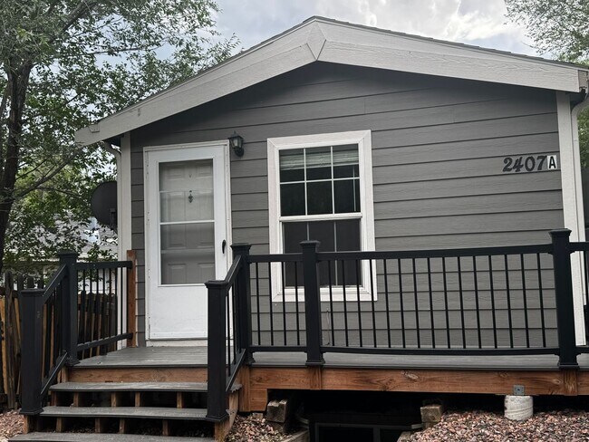 property at 2407 W Cache La Poudre St