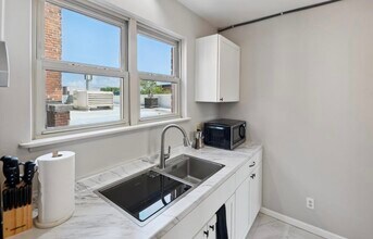 100 S Ann Arbor St, Unit 2 in Saline, MI - Building Photo - Building Photo