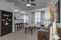 Spacious apartments equipped with crown molding and contemporary fixtures - Reserve At Beachline Apartments in Orlando, Florida