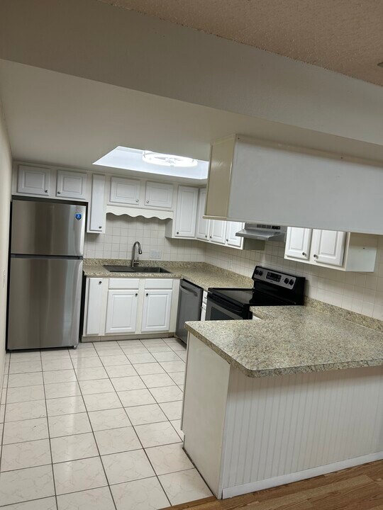 4026 Passport Ln, Unit 203 in New Port Richey, FL - Foto de edificio