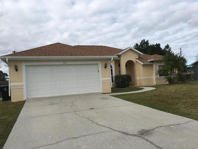 713 SW Ancona Rd in Port St. Lucie, FL - Building Photo - Building Photo