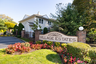 Village Estates in Amityville, NY - Building Photo - Building Photo