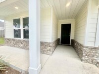 671 Whispering Creek Ave in Freeport, FL - Building Photo - Building Photo