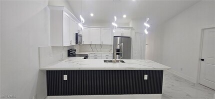 4925 Leonard Blvd S in Lehigh Acres, FL - Building Photo - Building Photo