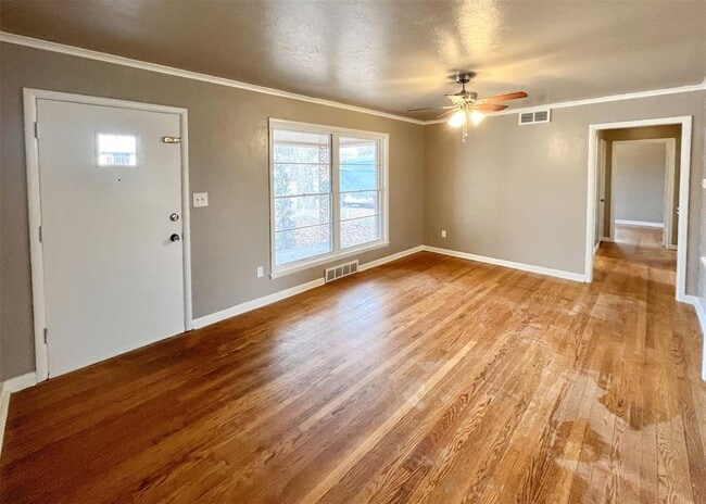 property at 208 E 14th St