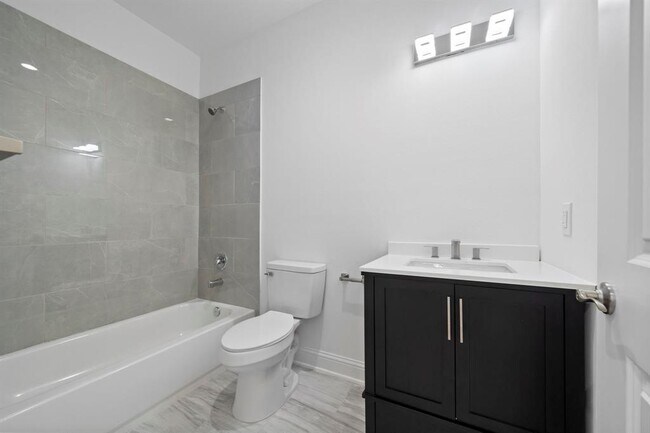 property at 1221 W 16th St