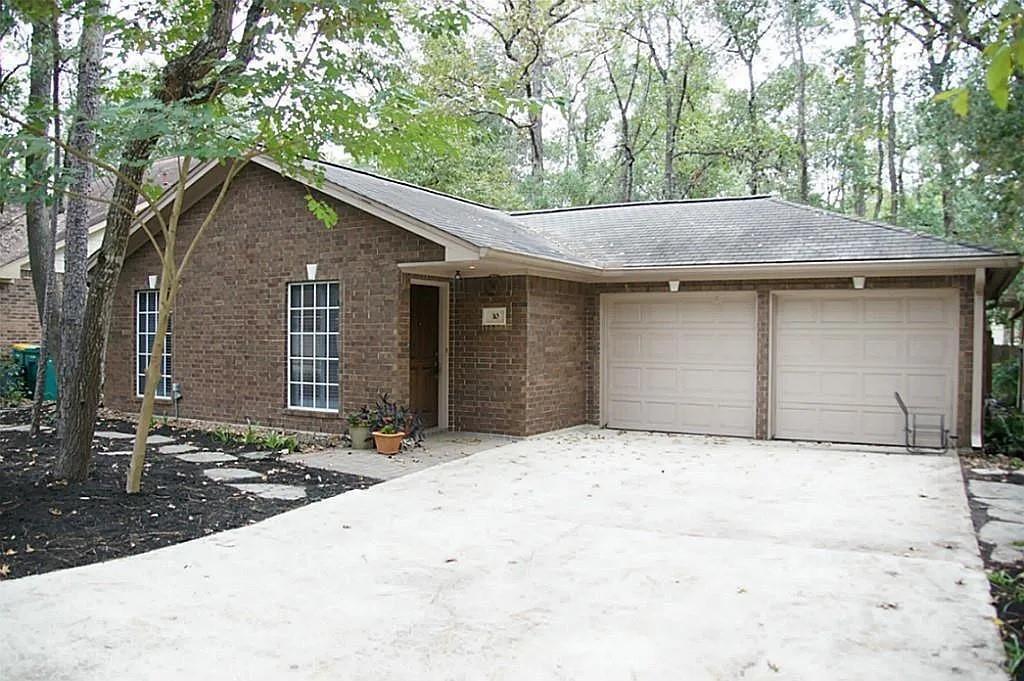 10 E Woodtimber Ct in Spring, TX - Building Photo