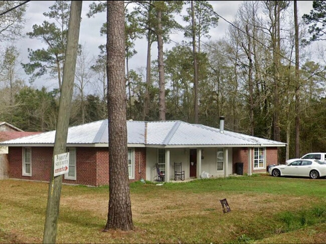 58050 Churchill Rd in Slidell, LA - Foto de edificio - Building Photo