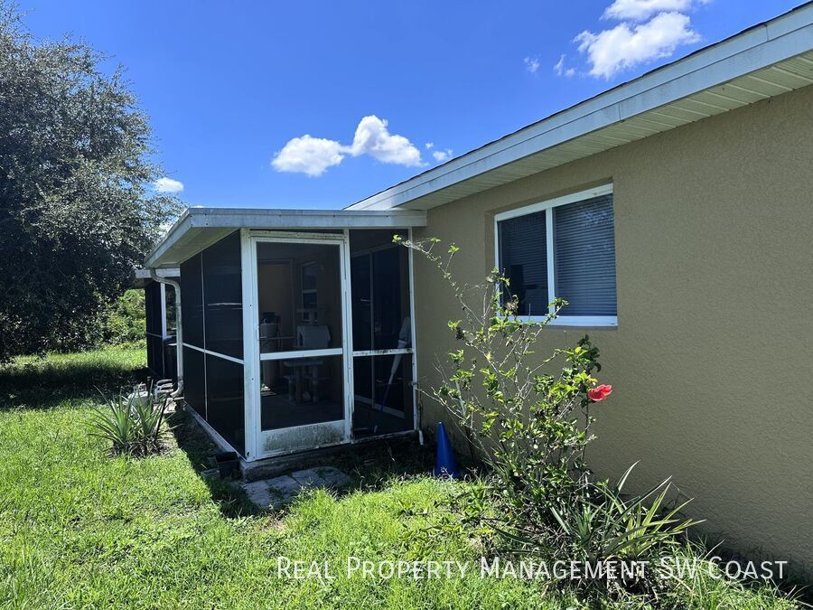 125 John Ave S in Lehigh Acres, FL - Building Photo