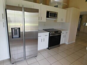5660 Piping Rock Dr in Boynton Beach, FL - Building Photo - Building Photo