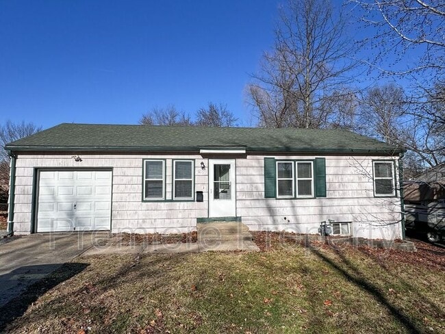 property at 16502 E 3rd St N