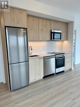 7439 Kingston Rd in Toronto, ON - Building Photo - Building Photo