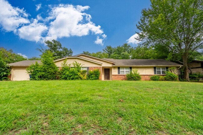 property at 6717 S Louisville Ave