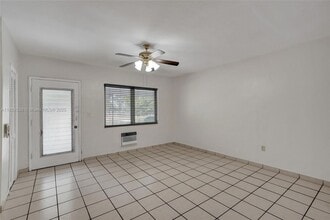 7300 Byron Ave, Unit 15B in Miami Beach, FL - Building Photo - Building Photo
