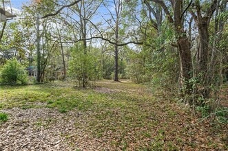 3128 Club House Rd in Mobile, AL - Foto de edificio - Building Photo