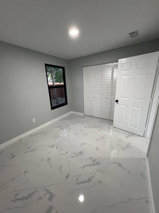 property at 285 NE 43rd St