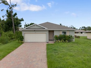 13680 Drysdale Ave in Port Charlotte, FL - Building Photo - Building Photo