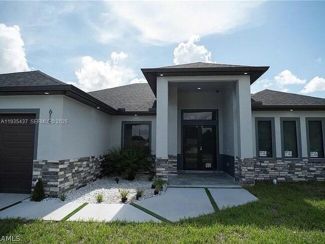 616 Maple Ave N in Lehigh Acres, FL - Building Photo - Building Photo