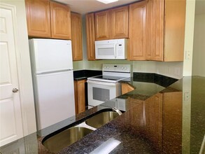 1985 Erving Cir-Unit -305 in Ocoee, FL - Building Photo - Building Photo