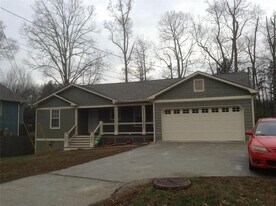 5620 Sycamore Rd in Sugar Hill, GA - Building Photo