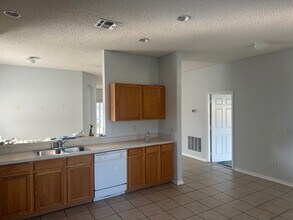 1733 Manchurian St in Groveland, FL - Foto de edificio - Building Photo