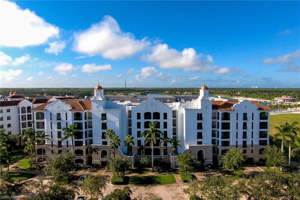 10723 Mirasol Dr-Unit -206 in Miromar Lakes, FL - Building Photo