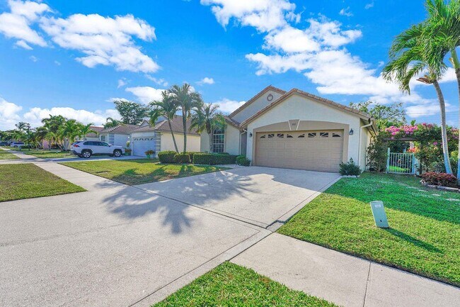 1883 Oak Berry Cir in Wellington, FL - Building Photo - Building Photo