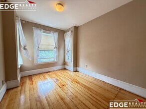 57 Rindge Ave, Unit 1 in Cambridge, MA - Building Photo - Building Photo