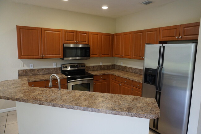 971 Tortuga Dr in Riviera Beach, FL - Building Photo - Building Photo