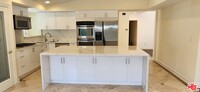 23018 Bigler St in Los Angeles, CA - Building Photo - Building Photo