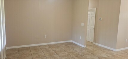 1111 Estate St E in Lehigh Acres, FL - Building Photo - Building Photo